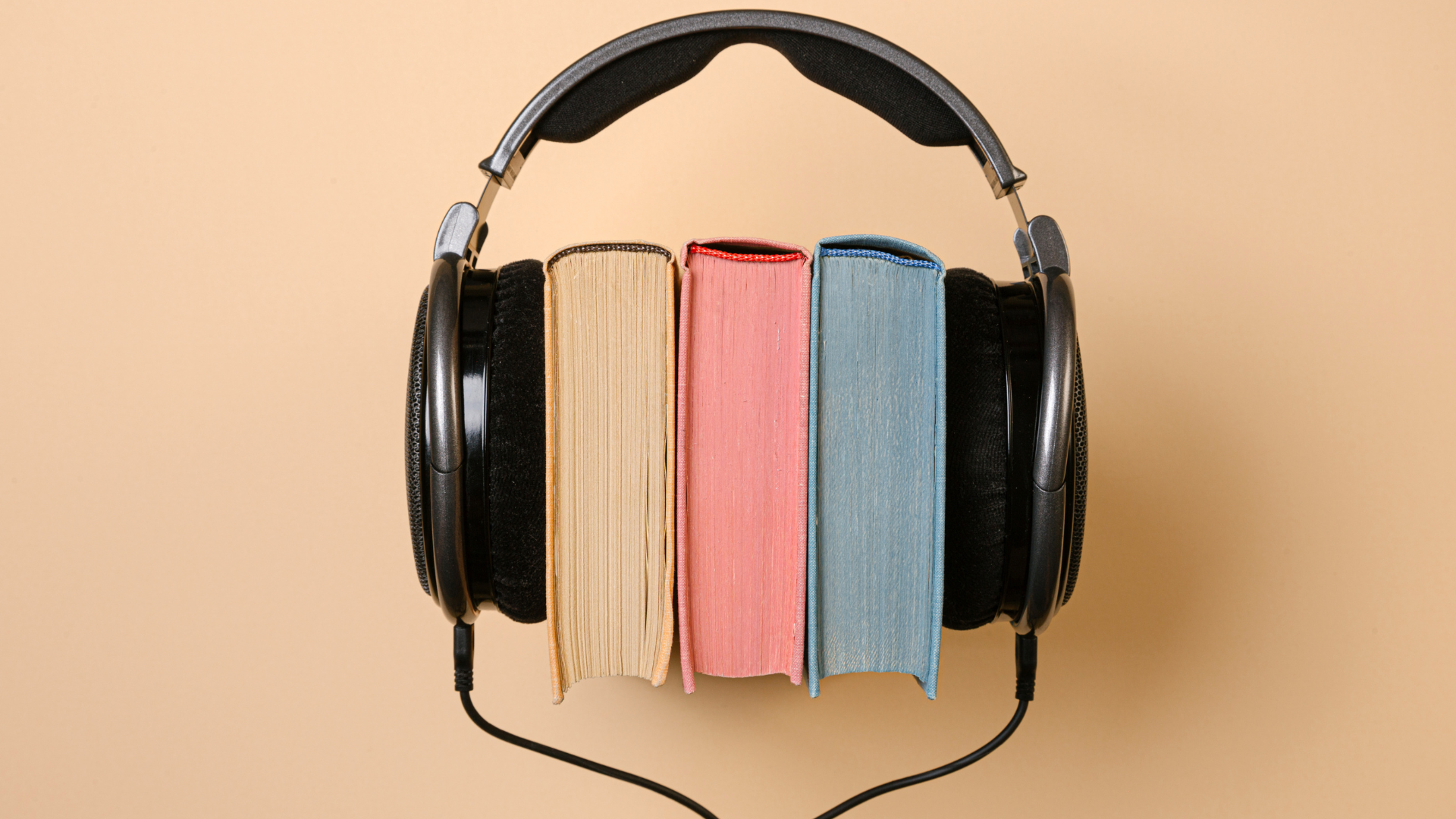 Headphones around books.