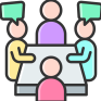 Four people at a table where two are speaking