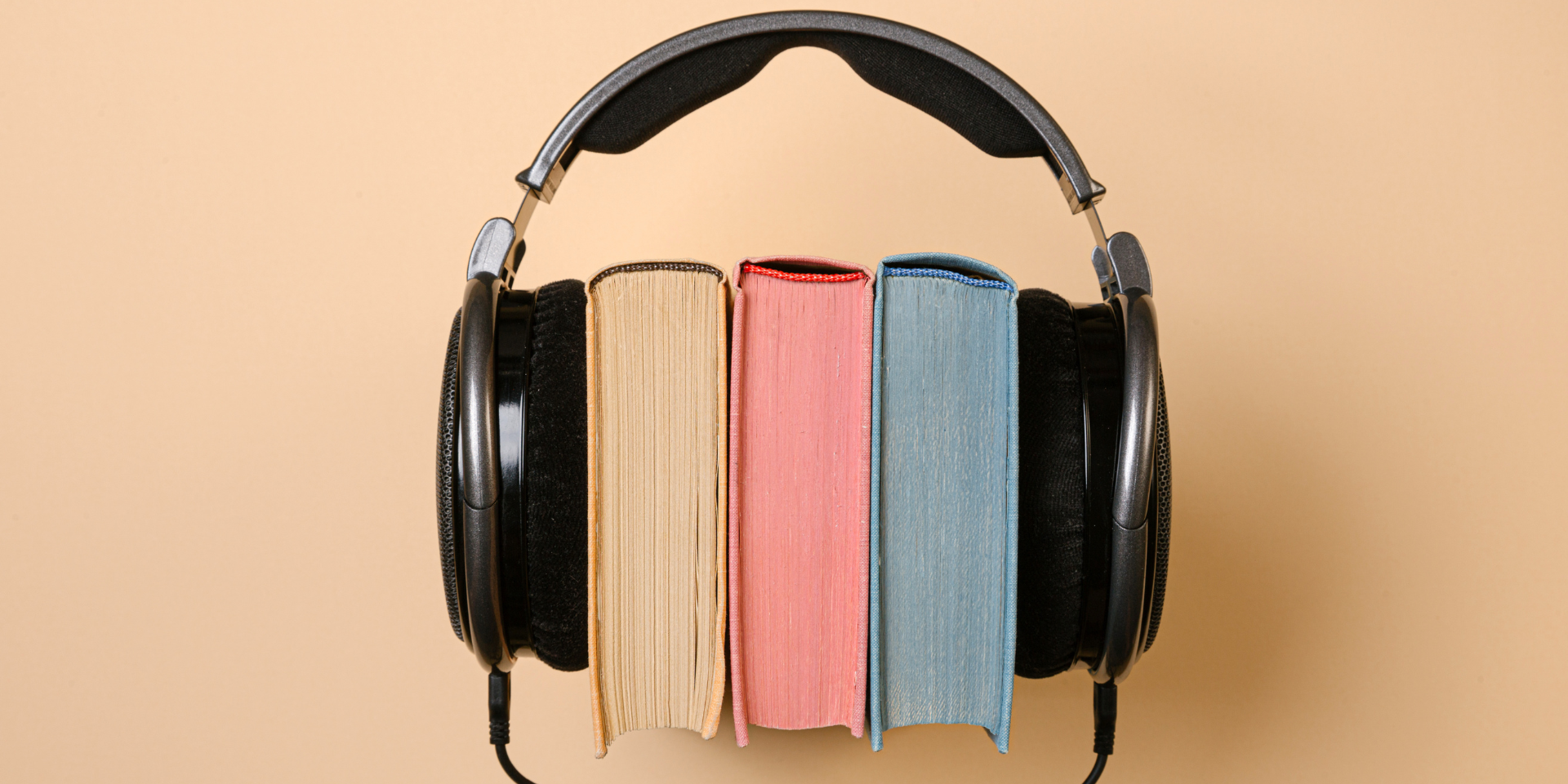 Headphones around books.