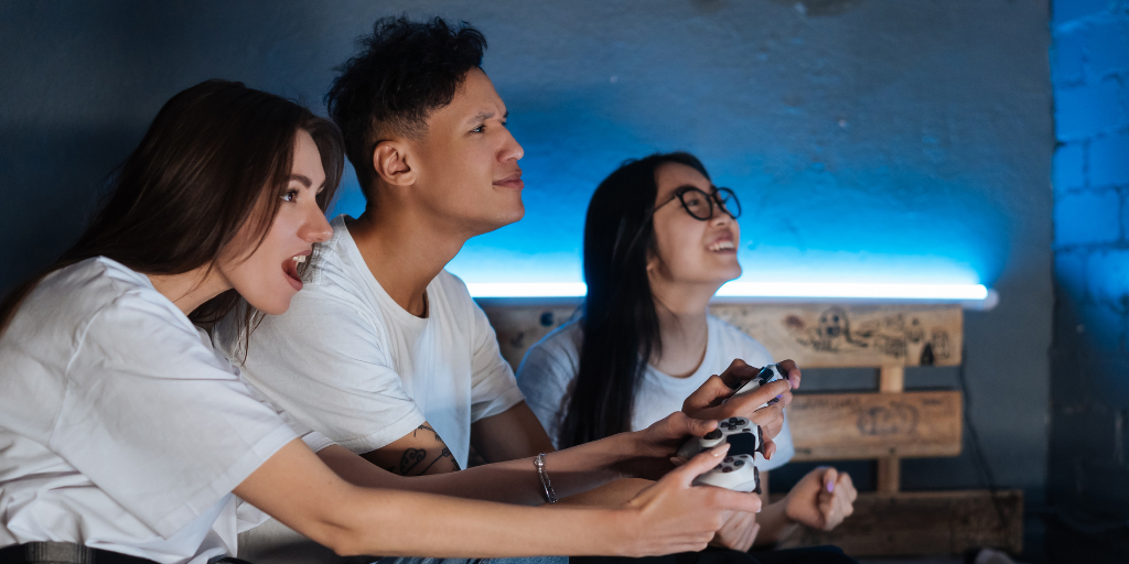 Three people playing a video game